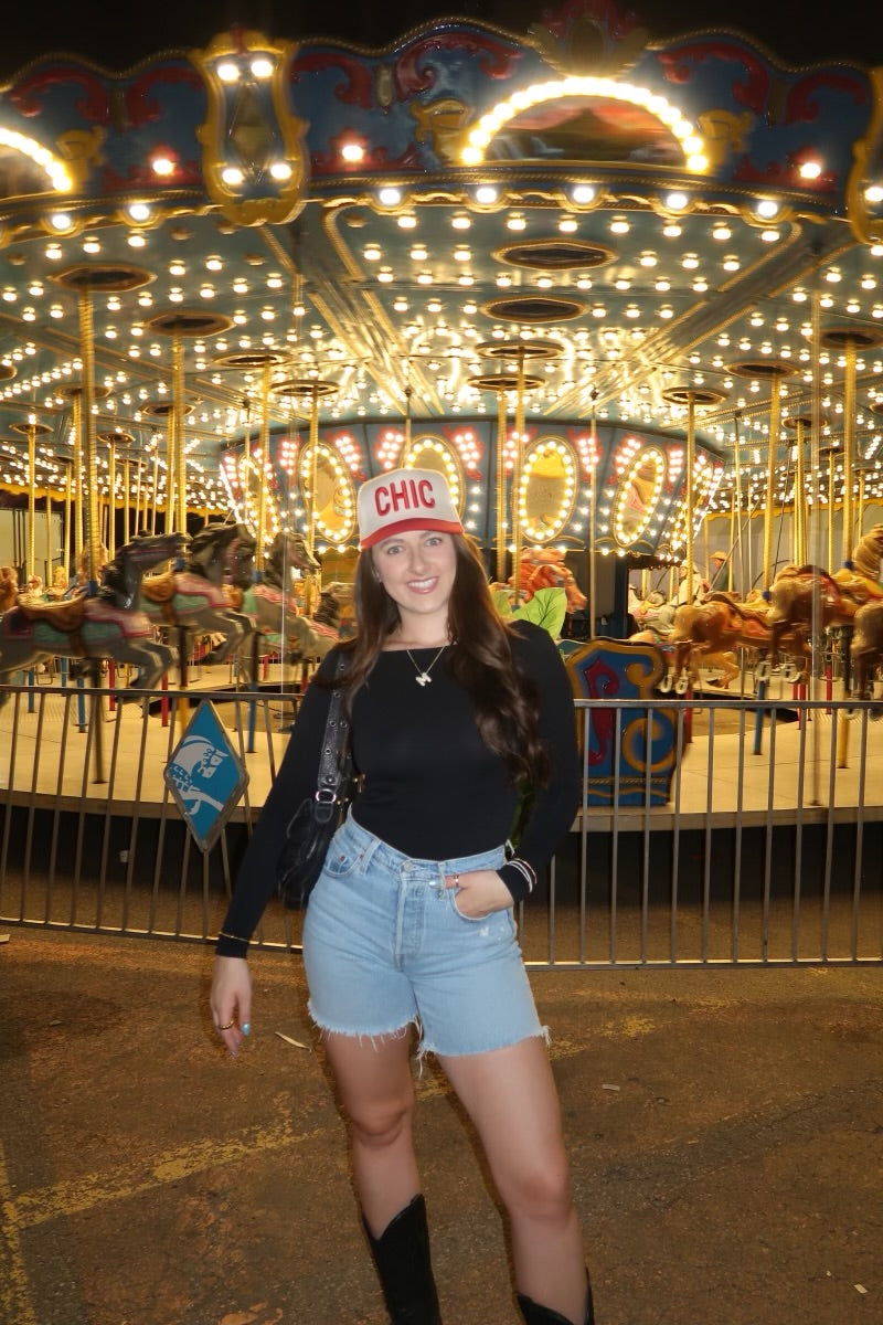 Free People Low Back Seamless Long Sleeve featuring a fitted design with a low back, made from soft, stretchy fabric for a comfortable and sleek look, Black