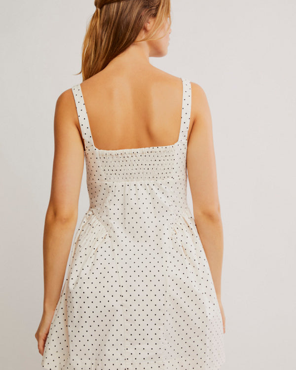 Free People Printed Astrid Mini Dress with a corset-style bodice, gathered bust and hip details, front buttons, and a vintage-inspired print, Ivory Polka-Dot