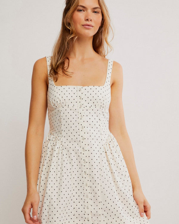 Free People Printed Astrid Mini Dress with a corset-style bodice, gathered bust and hip details, front buttons, and a vintage-inspired print, Ivory Polka-Dot