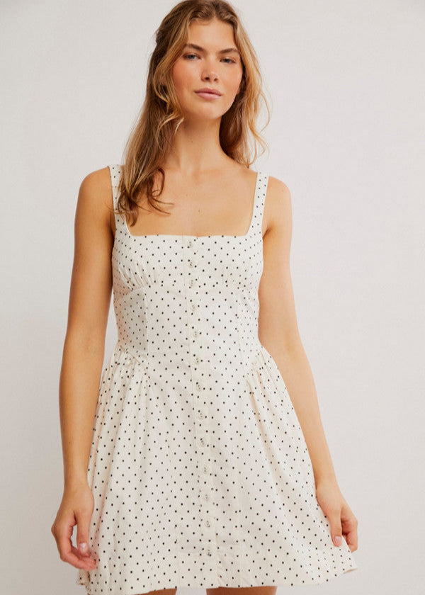 Free People Printed Astrid Mini Dress with a corset-style bodice, gathered bust and hip details, front buttons, and a vintage-inspired print, Ivory Polka-Dot