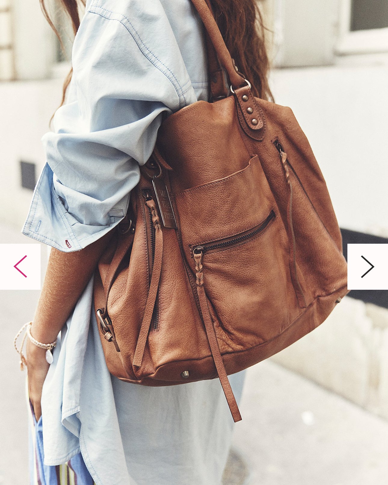 We the Free Emerson Tote Bag showcasing a spacious, simple design with sturdy handles, ideal for carrying essentials in style, Saddle