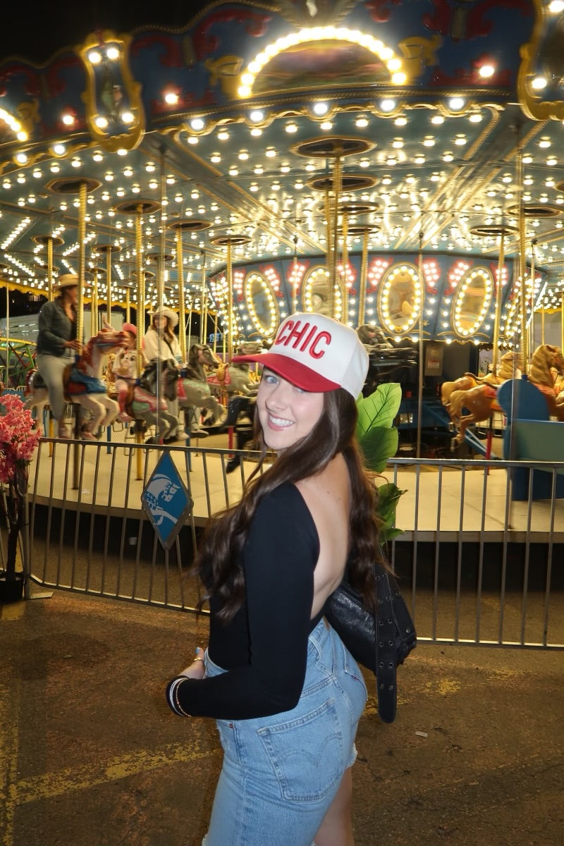 Free People Low Back Seamless Long Sleeve featuring a fitted design with a low back, made from soft, stretchy fabric for a comfortable and sleek look, Black