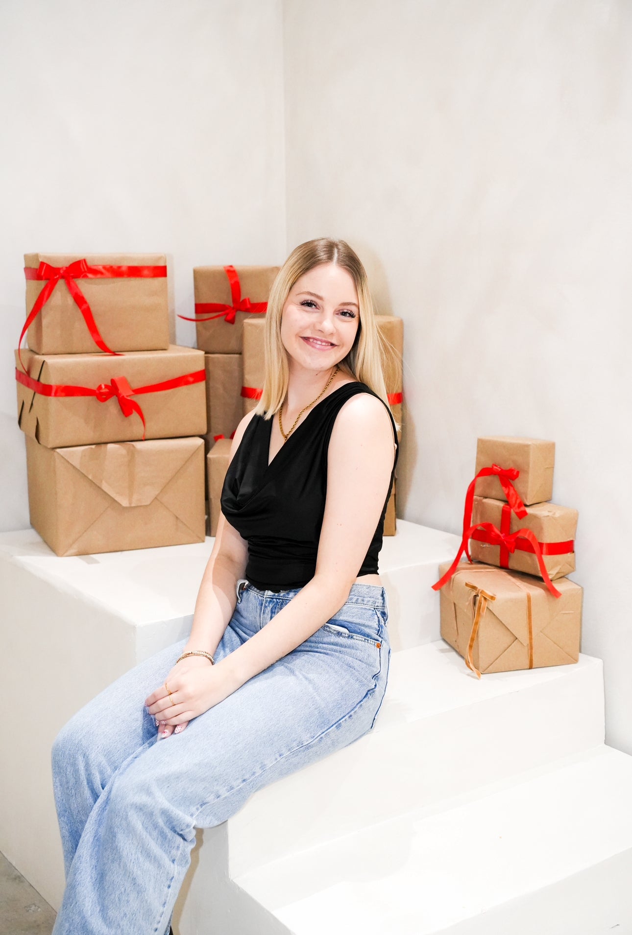 Free People City Nights Tuck In Top featuring soft, lightweight fabric with a slim fit and a cowl neckline. This top has a tucked-in waist design, Black