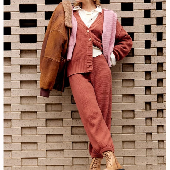 Free People Hailee Cardi Set featuring a soft, knit fabric with a relaxed fit. The set includes a long-sleeve, open-front cardigan and matching knit pants, offering a cozy and stylish look, perfect for casual wear or lounging, Canyon Sunset