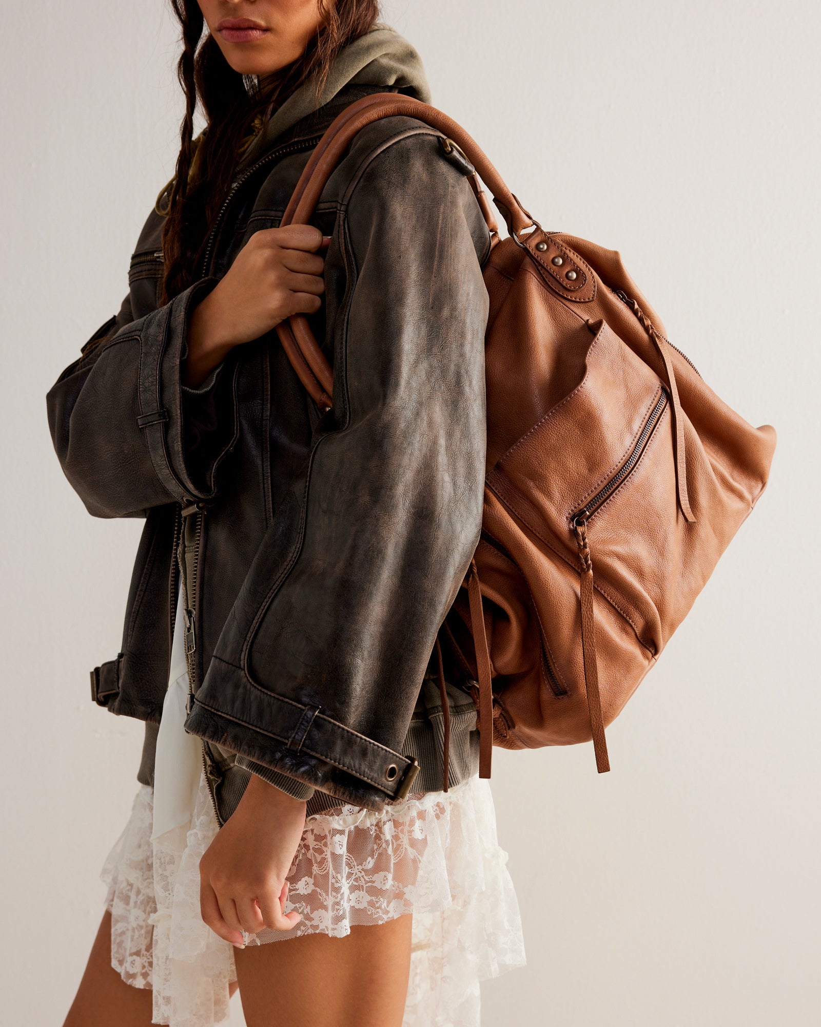 We the Free Emerson Tote Bag showcasing a spacious, simple design with sturdy handles, ideal for carrying essentials in style, Saddle