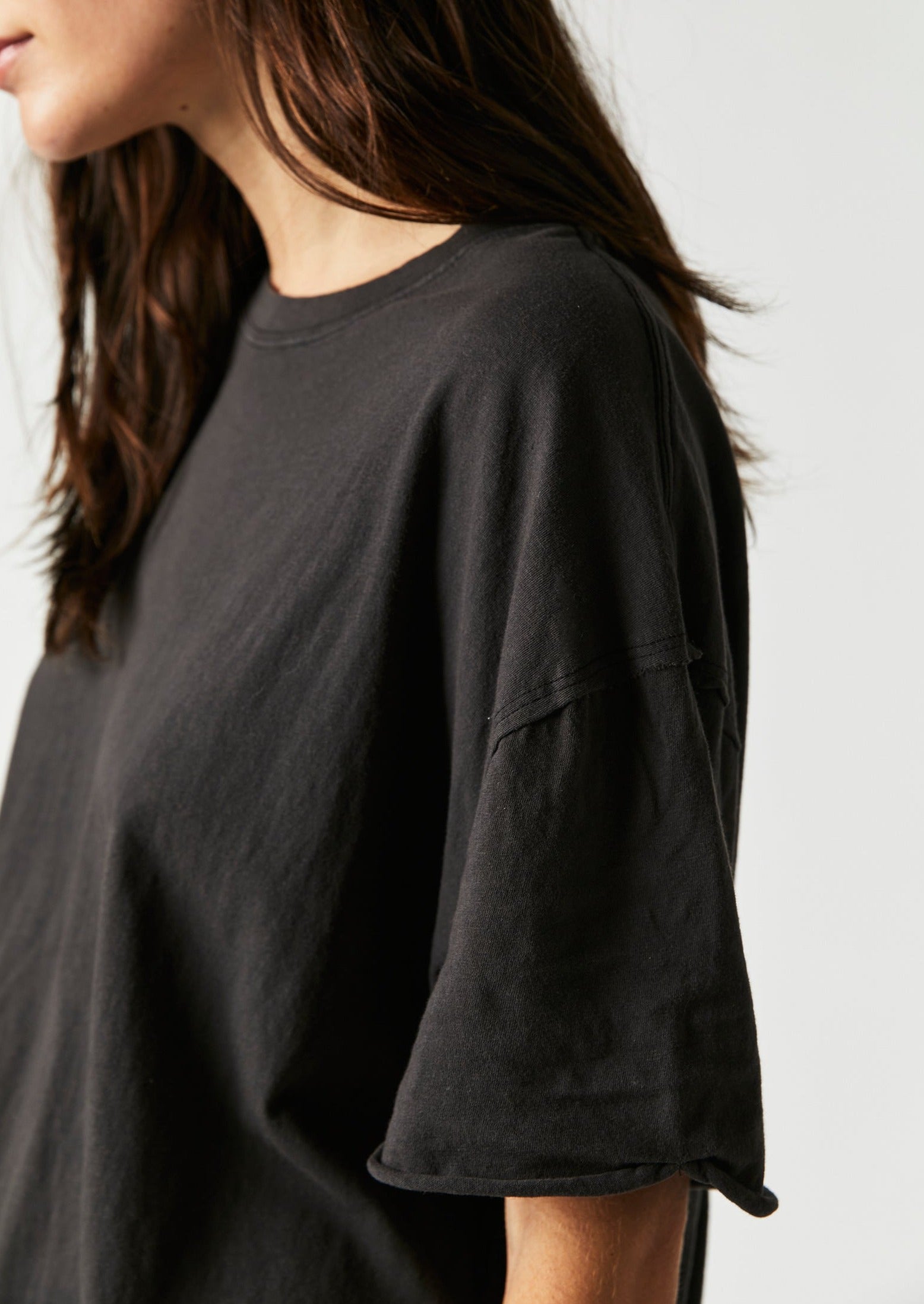 Free People The Nina Tee – A relaxed, classic-fit tee made from soft fabric, offering a comfortable and casual style, Black