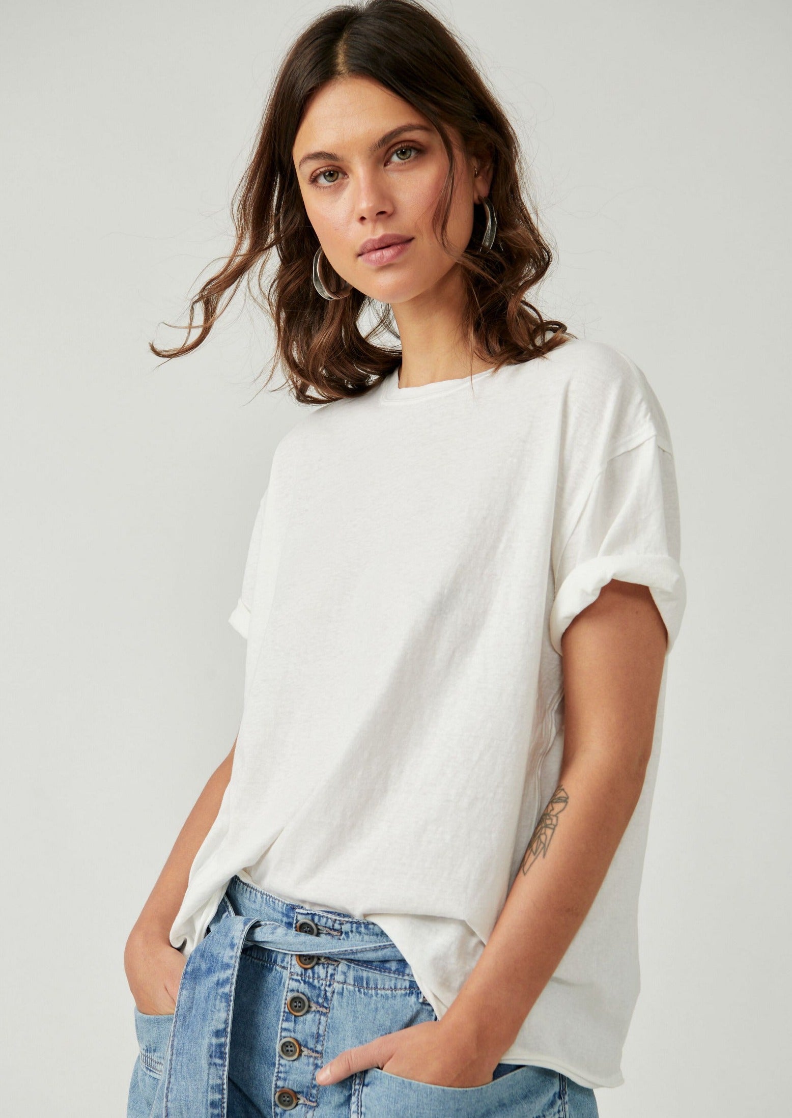 Free People The Nina Tee – A relaxed, classic-fit tee made from soft fabric, offering a comfortable and casual style, Ivory