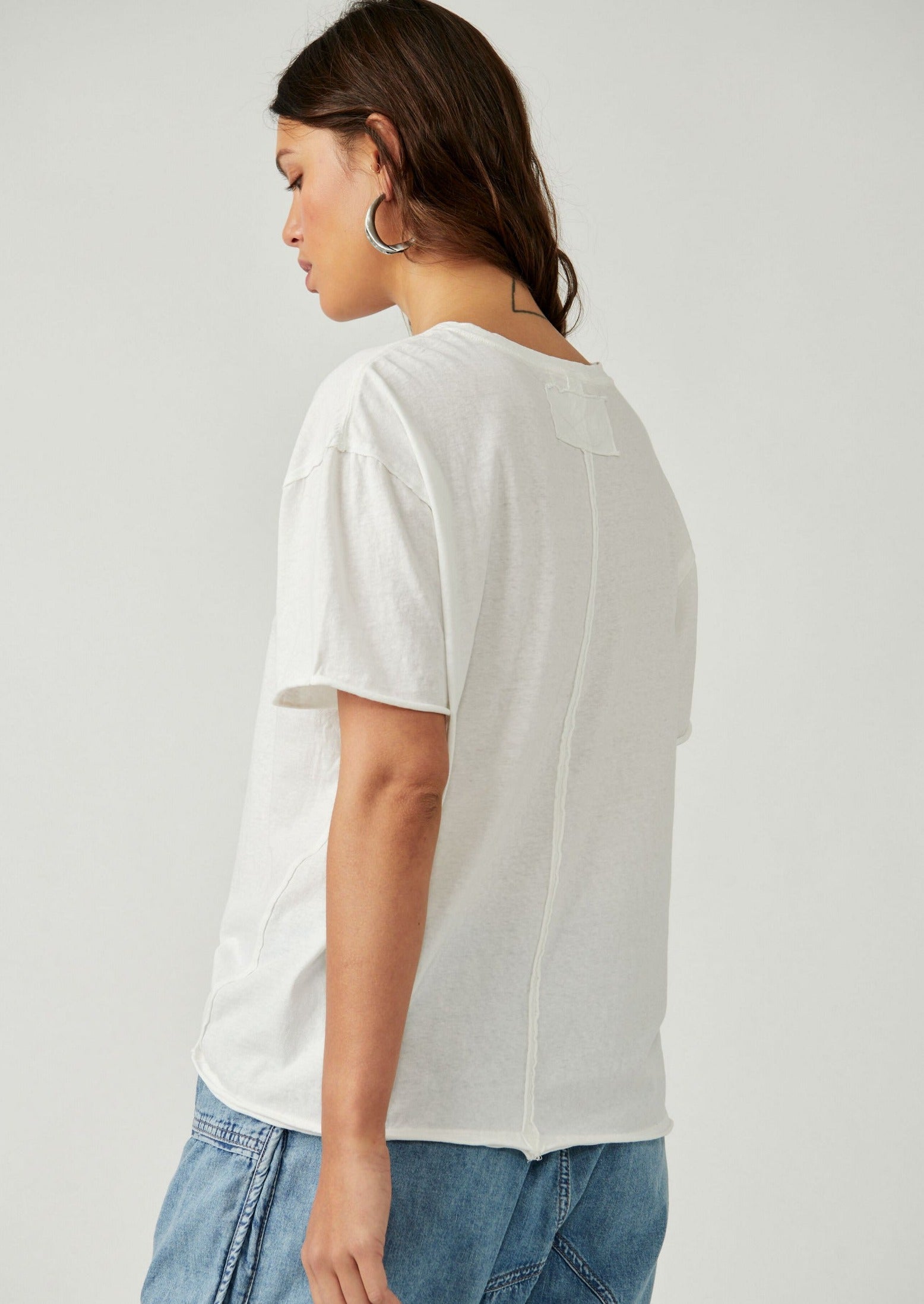 Free People The Nina Tee – A relaxed, classic-fit tee made from soft fabric, offering a comfortable and casual style, Ivory