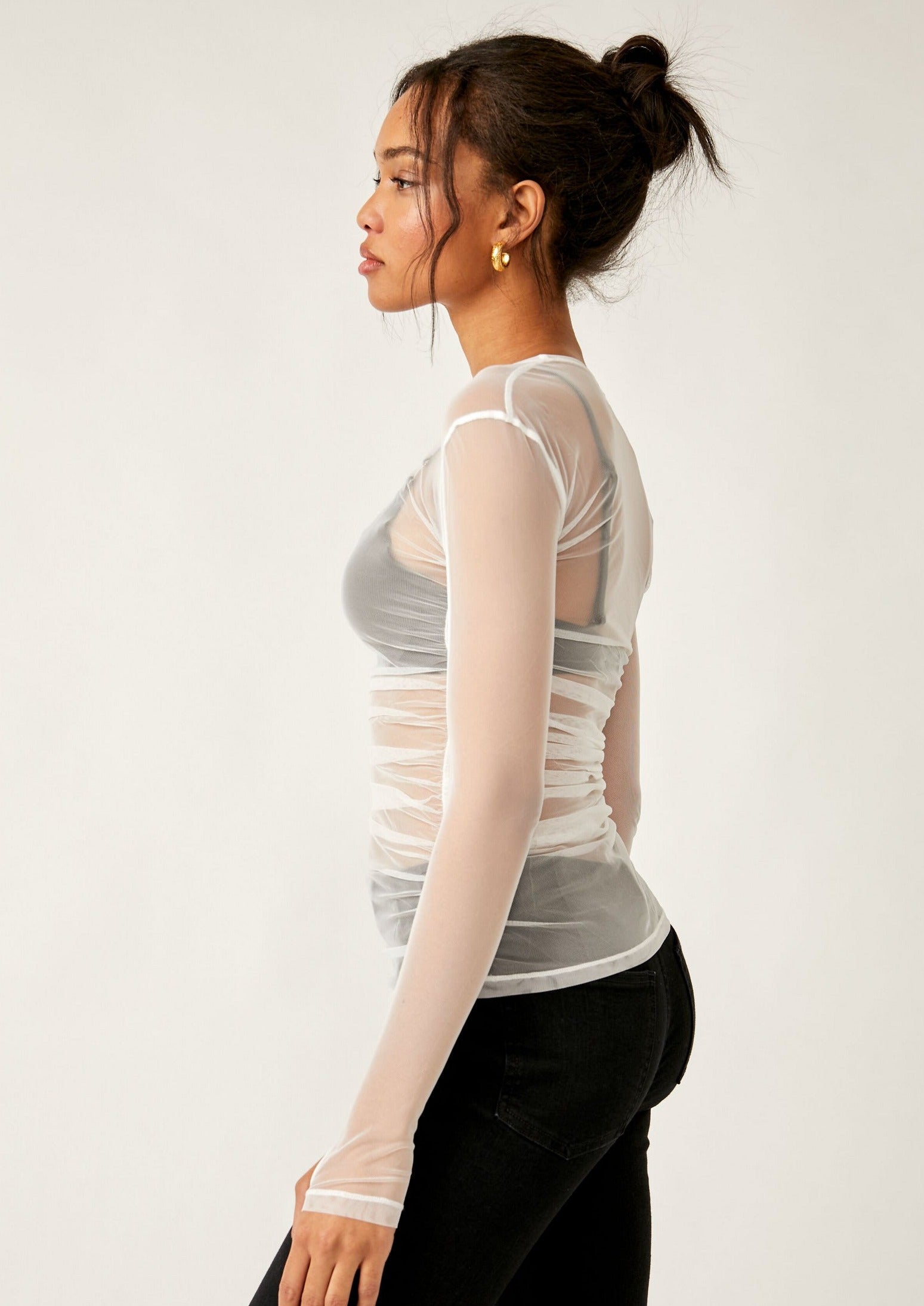 Free People Last Layer Long Sleeve – A fitted mesh long sleeve top with a scoop neckline, offering a lightweight, breathable layer for a stylish and comfortable look, Ivory
