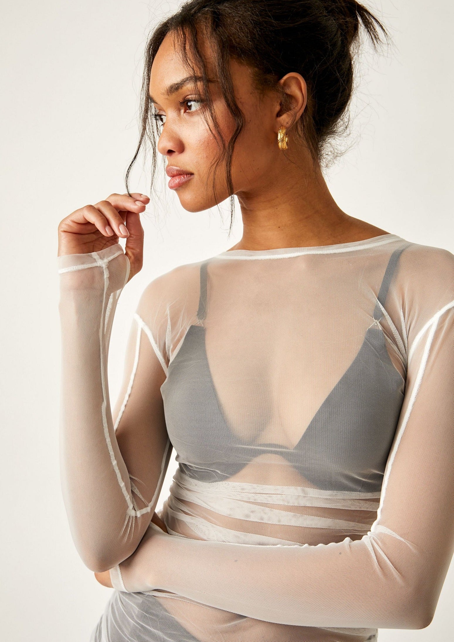 Free People Last Layer Long Sleeve – A fitted mesh long sleeve top with a scoop neckline, offering a lightweight, breathable layer for a stylish and comfortable look, Ivory