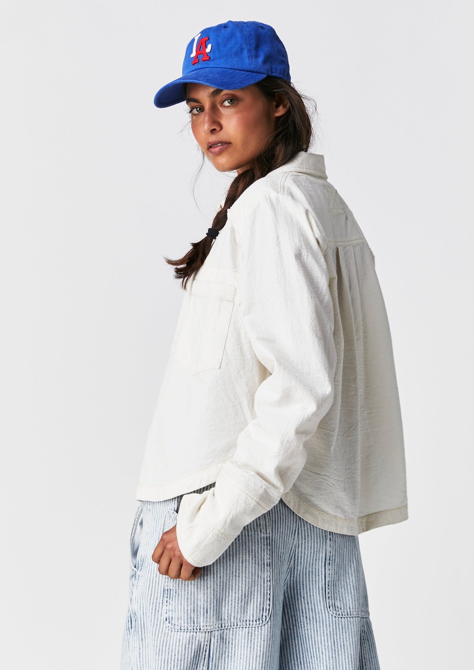 Free People Classic Oxford Top – A timeless button-down shirt with a relaxed fit, featuring a crisp, structured design and rolled-up sleeves for a casual, effortless look, Ivory