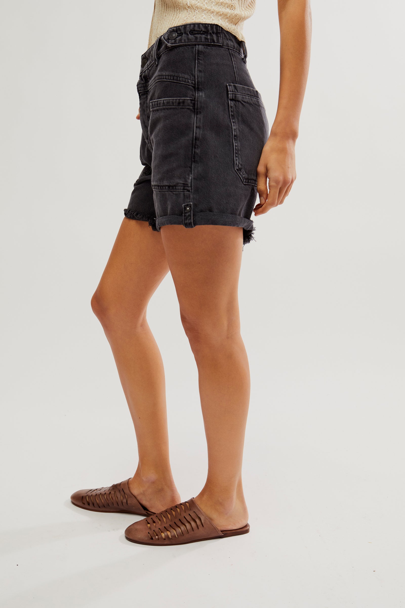 We The Free Palmer Shorts made from soft denim with a relaxed, easy fit. These shorts feature an elastic waistband with a drawstring, offering a comfortable and casual look, perfect for warmer days or relaxed outings, Outer Space