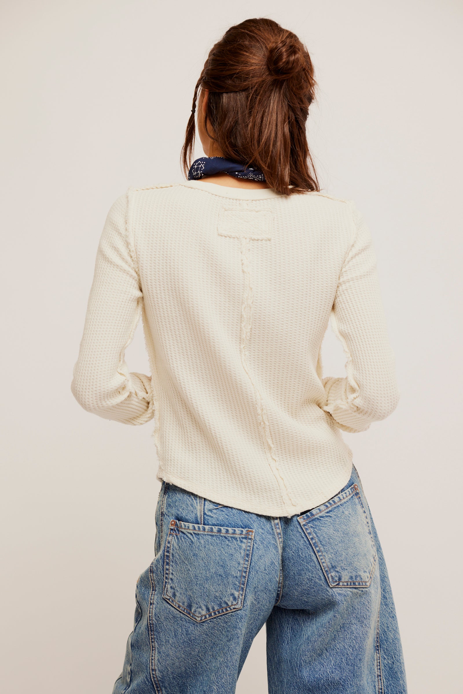 Free People Lucky Locket Tee made from soft, lightweight fabric with a relaxed fit. This short-sleeve tee features a scoop neckline and a unique graphic design with a locket-inspired print, Ivory