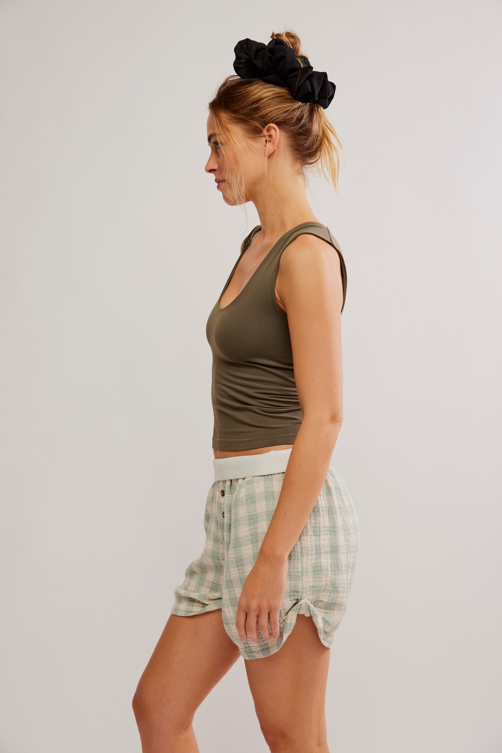 Free People Clean Lines Muscle Cami featuring a relaxed fit, sleeveless design, and scoop neckline, made from soft fabric for an easy, comfortable style, Tarmac