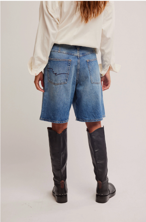 We The Free Montana Shorts with a relaxed, mid-rise fit and a button and zipper closure. Made from soft, lightweight fabric, these casual shorts feature a distressed, worn-in look with frayed hems for a laid-back, boho-inspired style, Haven