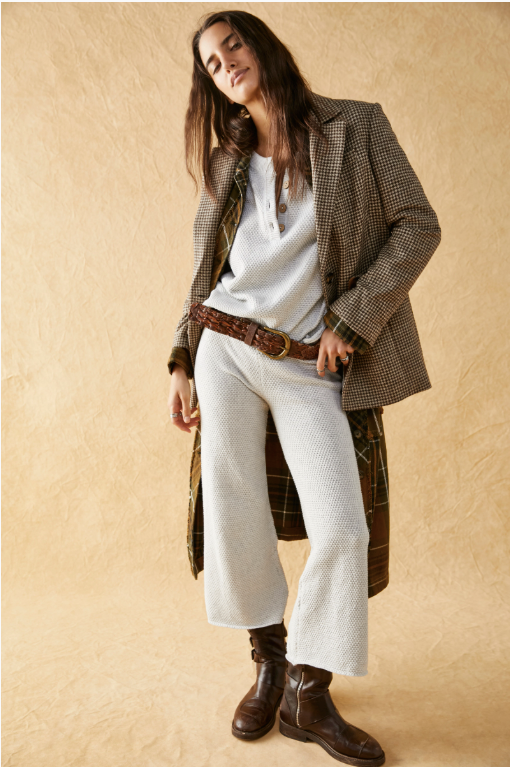 Free People Hailee Sweater Set featuring a soft, ribbed knit long-sleeve sweater and matching high-waisted, wide-leg pants. The relaxed fit of both pieces offers a comfortable and stylish look, perfect for lounging or casual outings, Ivory Heather