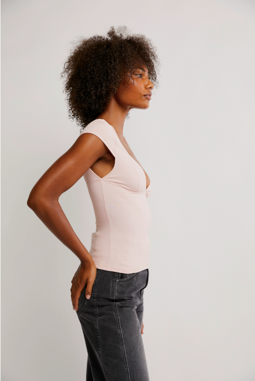 Free People Duo Corset Cami with a sweetheart neckline, capped sleeves, seamed cup design, and sculpting Duo fabric featuring a compressive mesh underlayer, Ballet