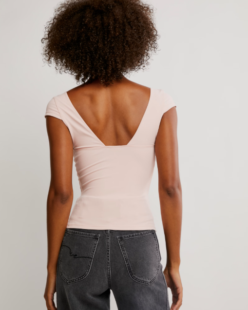 Free People Duo Corset Cami with a sweetheart neckline, capped sleeves, seamed cup design, and sculpting Duo fabric featuring a compressive mesh underlayer, Ballet