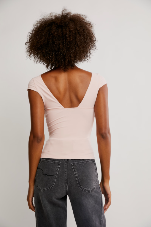 Free People Duo Corset Cami with a sweetheart neckline, capped sleeves, seamed cup design, and sculpting Duo fabric featuring a compressive mesh underlayer, Ballet