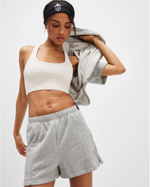Free People Back Me Up Set – A relaxed, breathable two-piece set featuring a tunic-style top with side seam slits and a crew neckline, paired with high-rise shorts with side pockets and a dropped inseam, Heather Grey