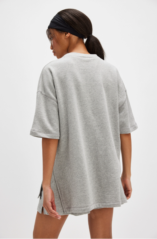 Free People Back Me Up Set – A relaxed, breathable two-piece set featuring a tunic-style top with side seam slits and a crew neckline, paired with high-rise shorts with side pockets and a dropped inseam, Heather Grey