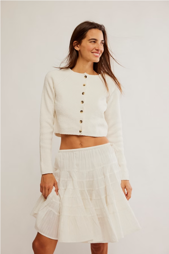 Free People Sydney Shrunken Cardi – A cropped, fitted cardigan with a button-down front, knit texture, and long sleeves, offering a cozy and stylish layer, Optic White