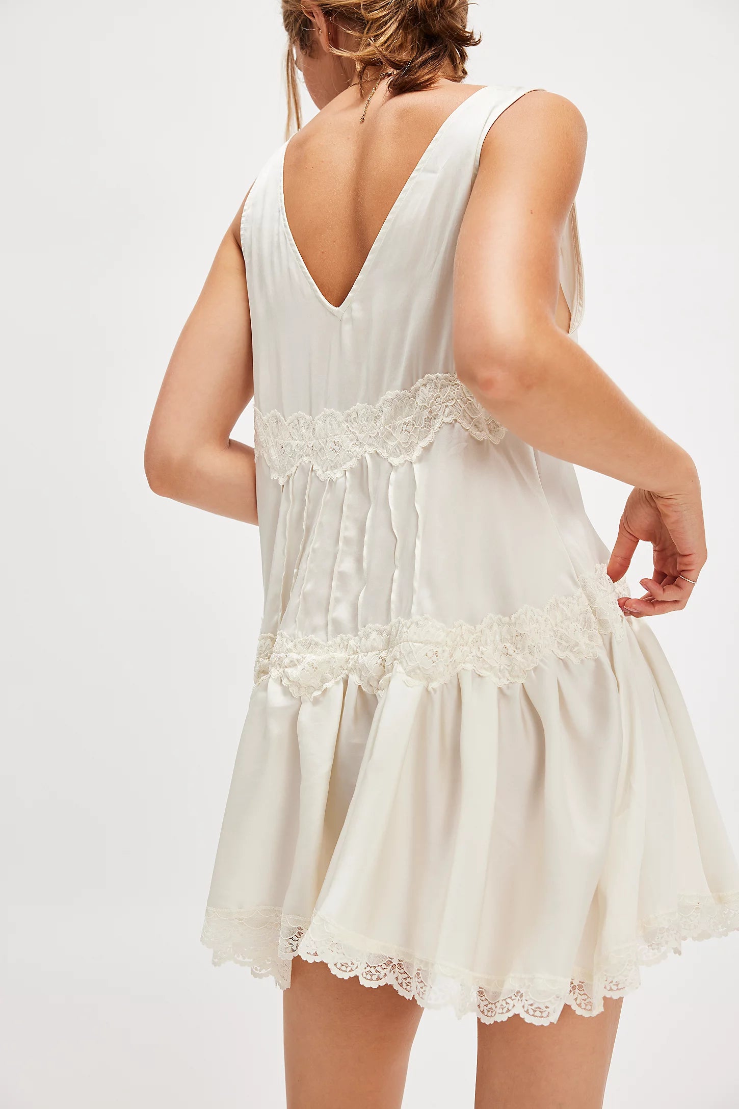 Free People In This Groove Mini Slip Dress – a silky mini slip dress with a plunging neckline and flattering A-line silhouette, Tofu