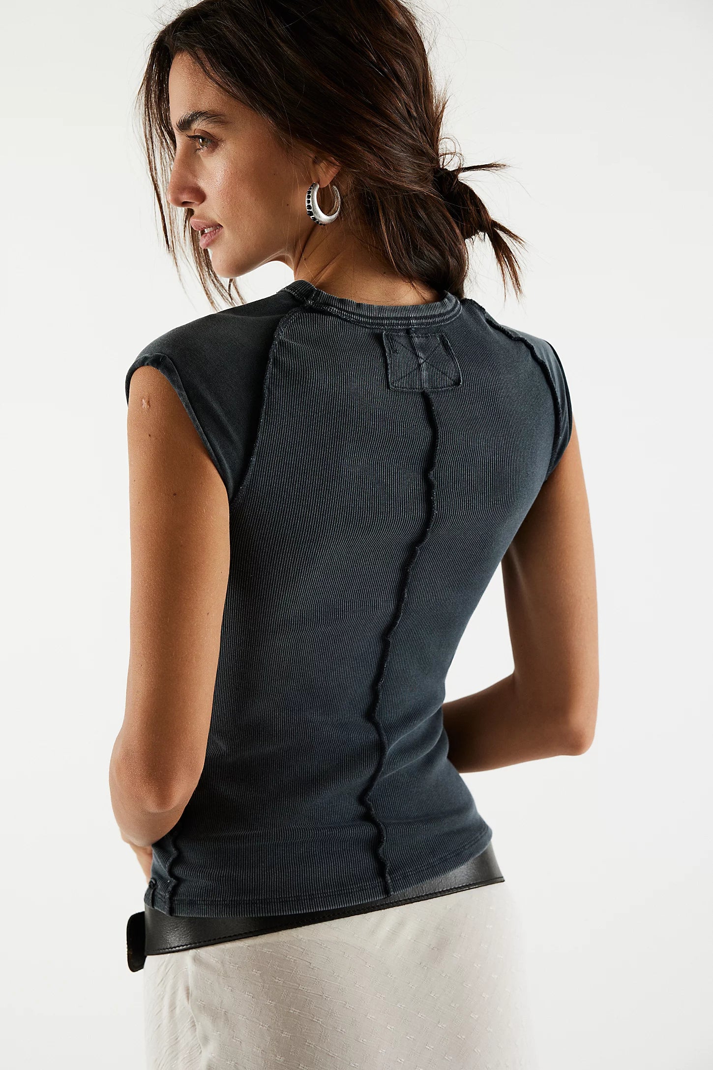 We The Free Ever Had Tee — a slim-fit, hip-length T-shirt with a soft, ribbed, and stretchy texture, featuring a classic crew neckline, cap-style sleeves, subtle raised seam detailing, and a clean, minimal design, Black