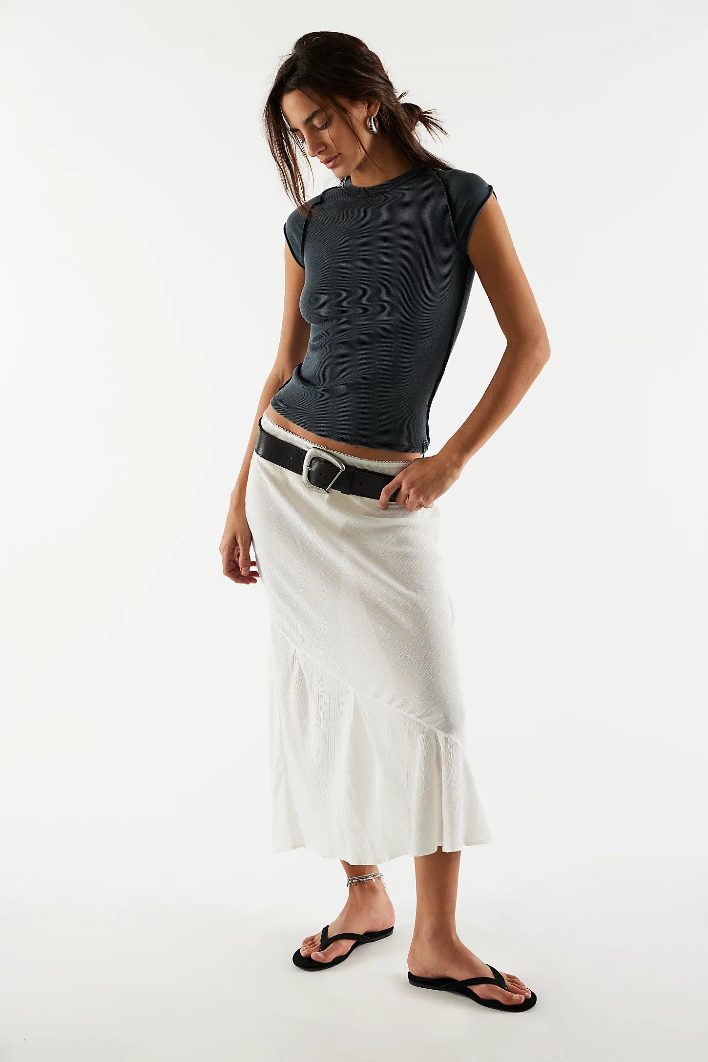 We The Free Ever Had Tee — a slim-fit, hip-length T-shirt with a soft, ribbed, and stretchy texture, featuring a classic crew neckline, cap-style sleeves, subtle raised seam detailing, and a clean, minimal design, Black