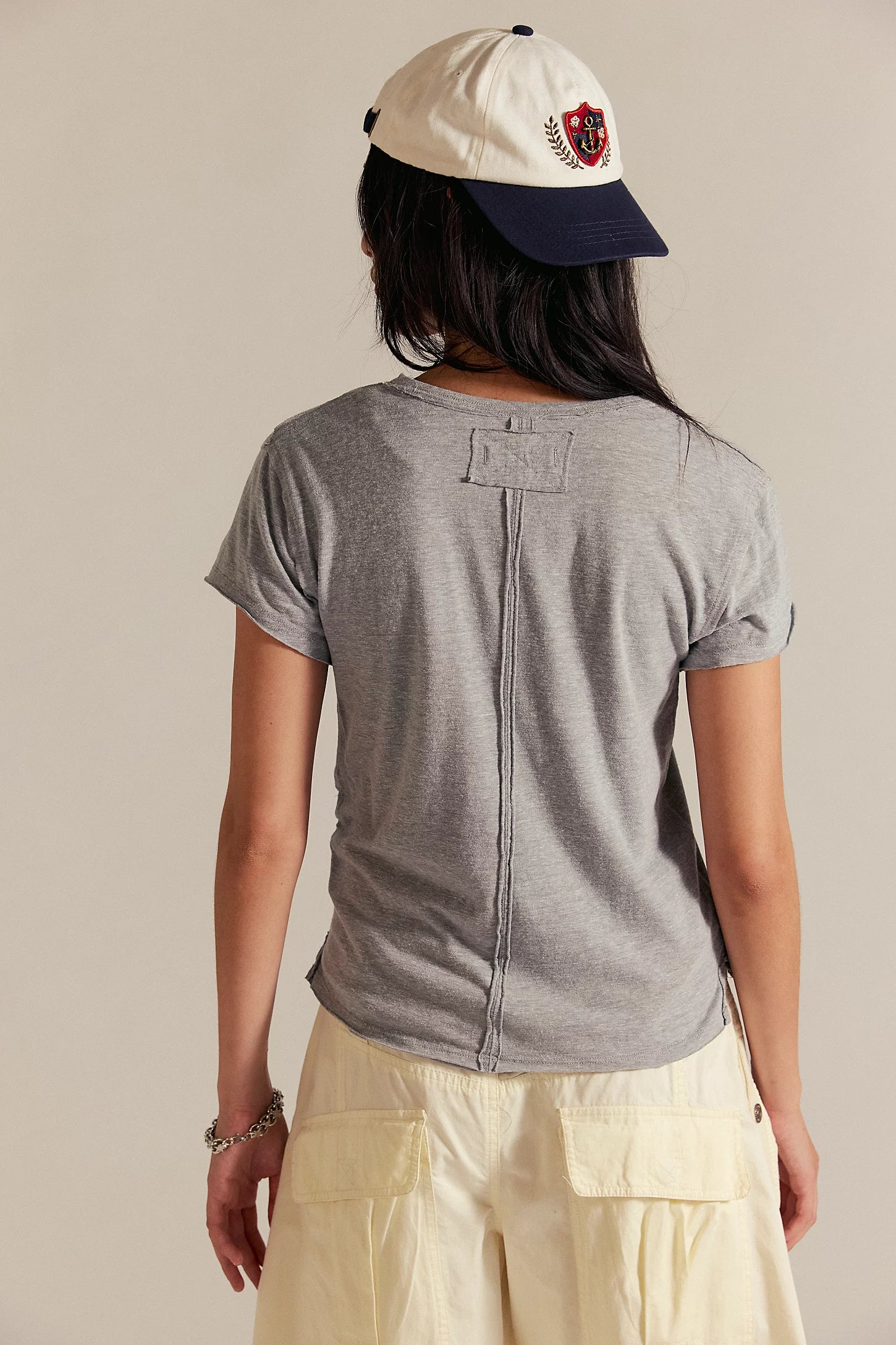 Free People Nova Tee – a relaxed-fit, short-sleeve cotton t-shirt with a raw hem and vintage-inspired faded wash, Greyhound