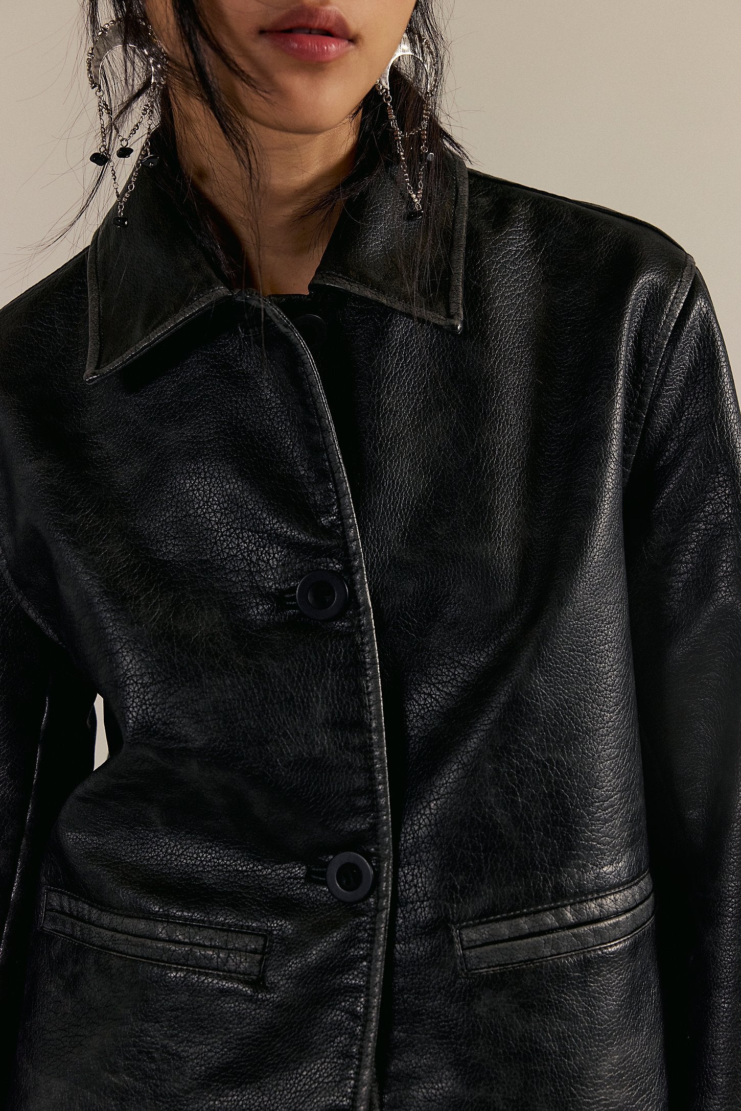 Free People Hera Vegan Leather Jacket with a boxy fit, smooth cruelty-free faux leather, minimalist design, and versatile style, Black