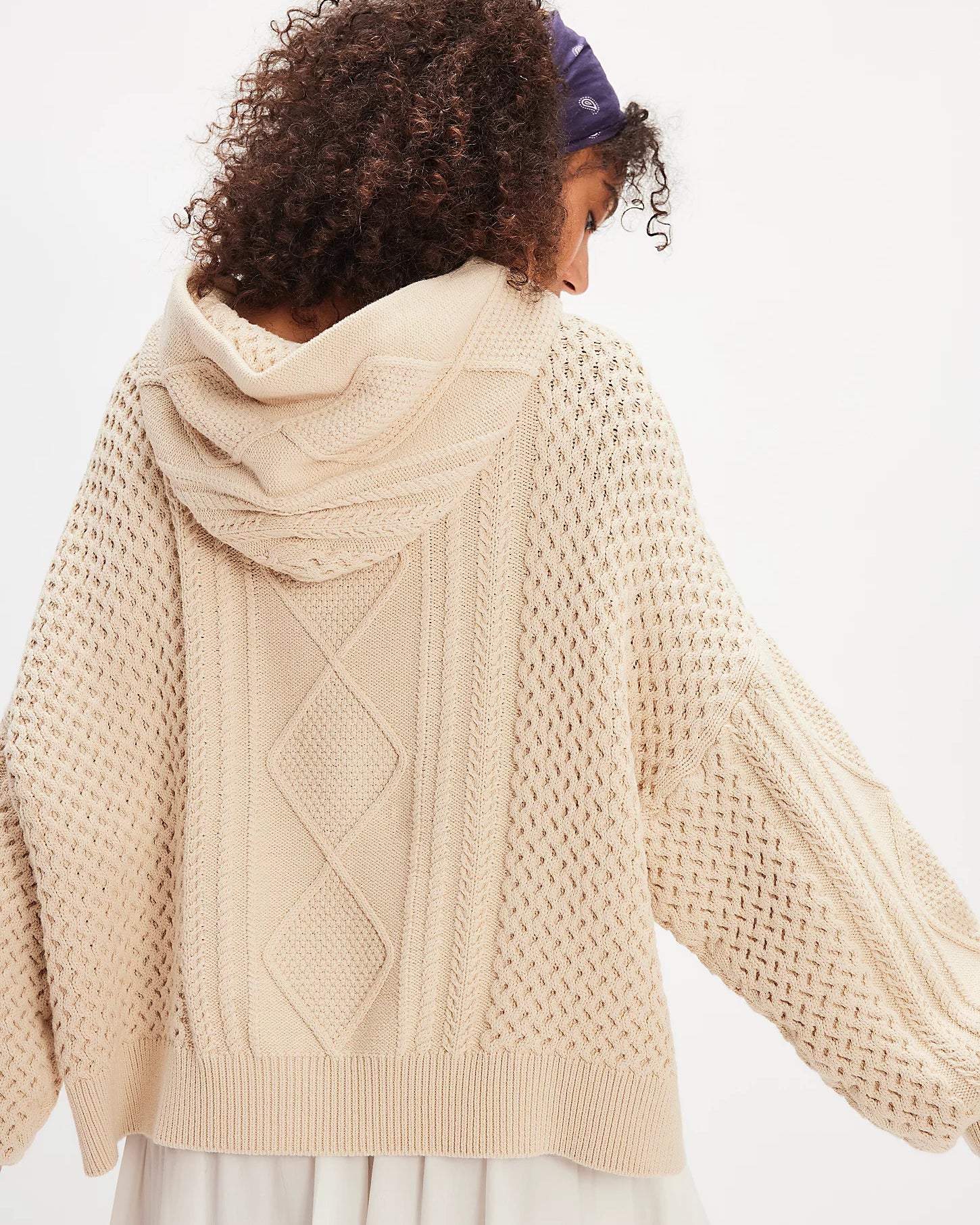 Free People Explorer Cable Hoodie featuring chunky cable knit texture, slouchy oversized fit, and cozy hood, Macadamia