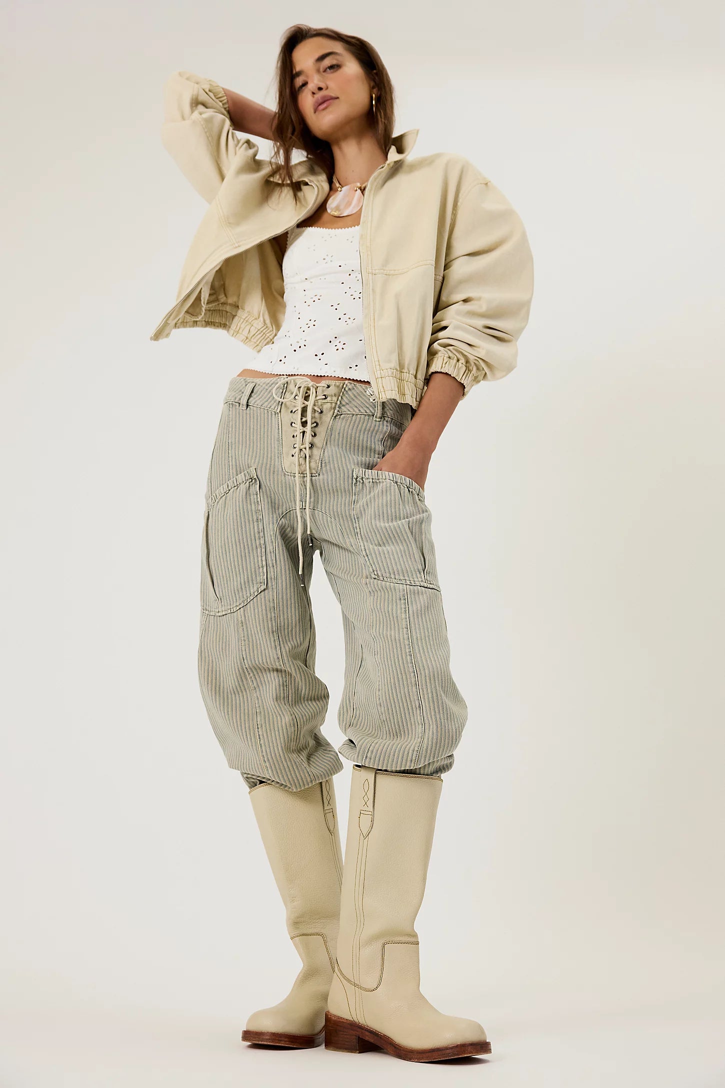 Free People Blaze Pull-On Boots featuring a tall silhouette, square toe, and stacked leather heel with distressed details, Parchment Leather