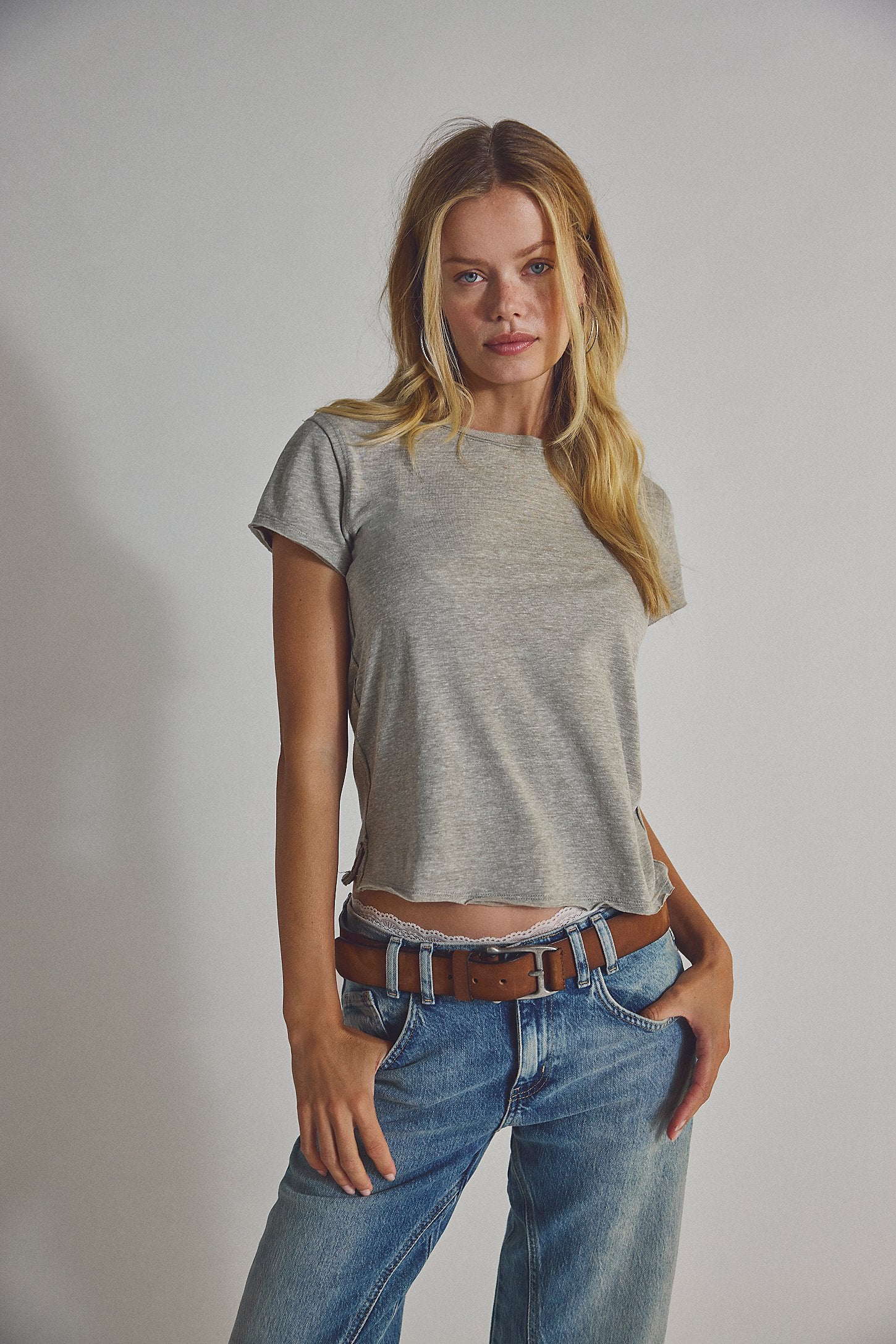 Free People Nova Tee – a relaxed-fit, short-sleeve cotton t-shirt with a raw hem and vintage-inspired faded wash, Greyhound