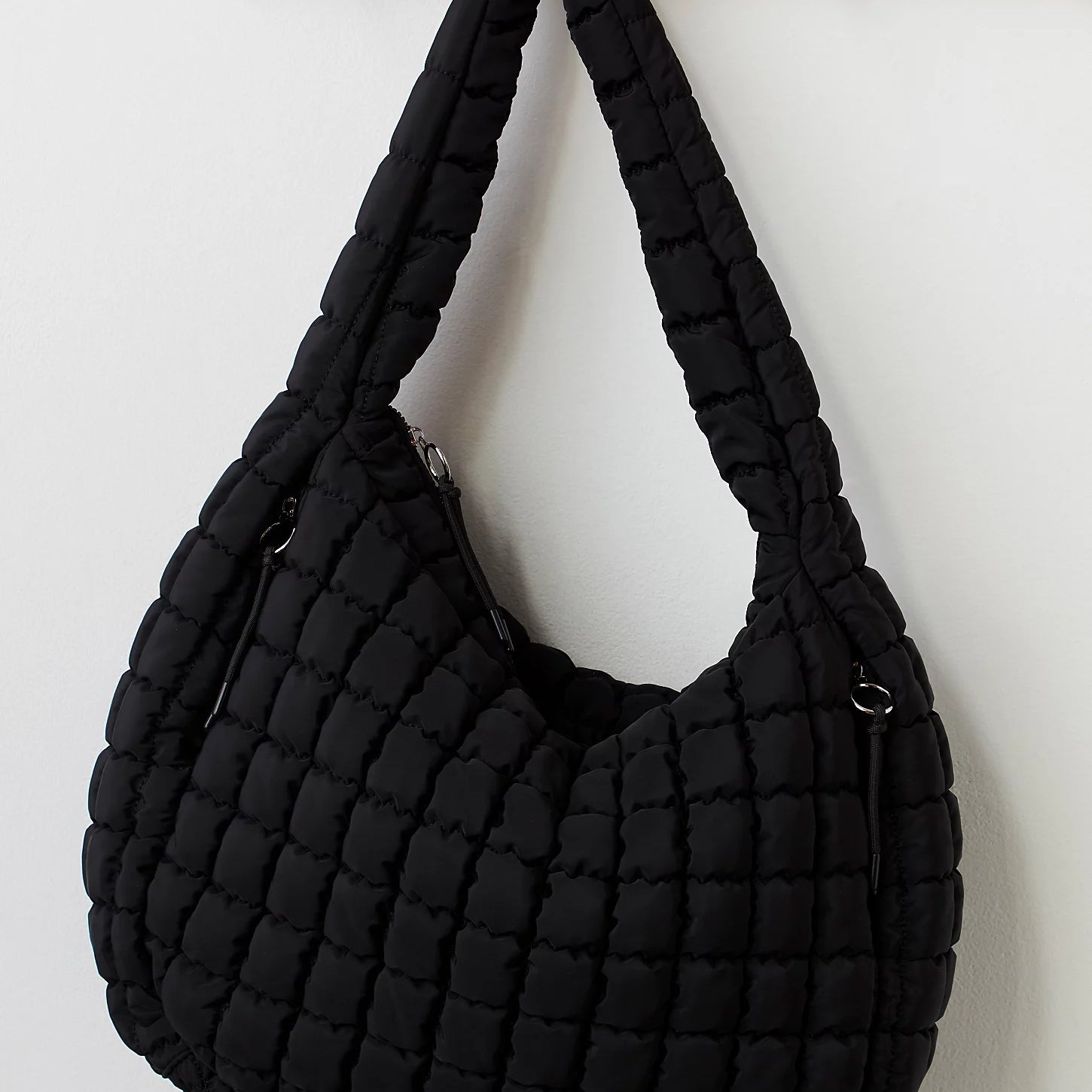 Free People Movement quilted carryall bag, oversized tote with padded texture, spacious interior, and casual sporty style, Black