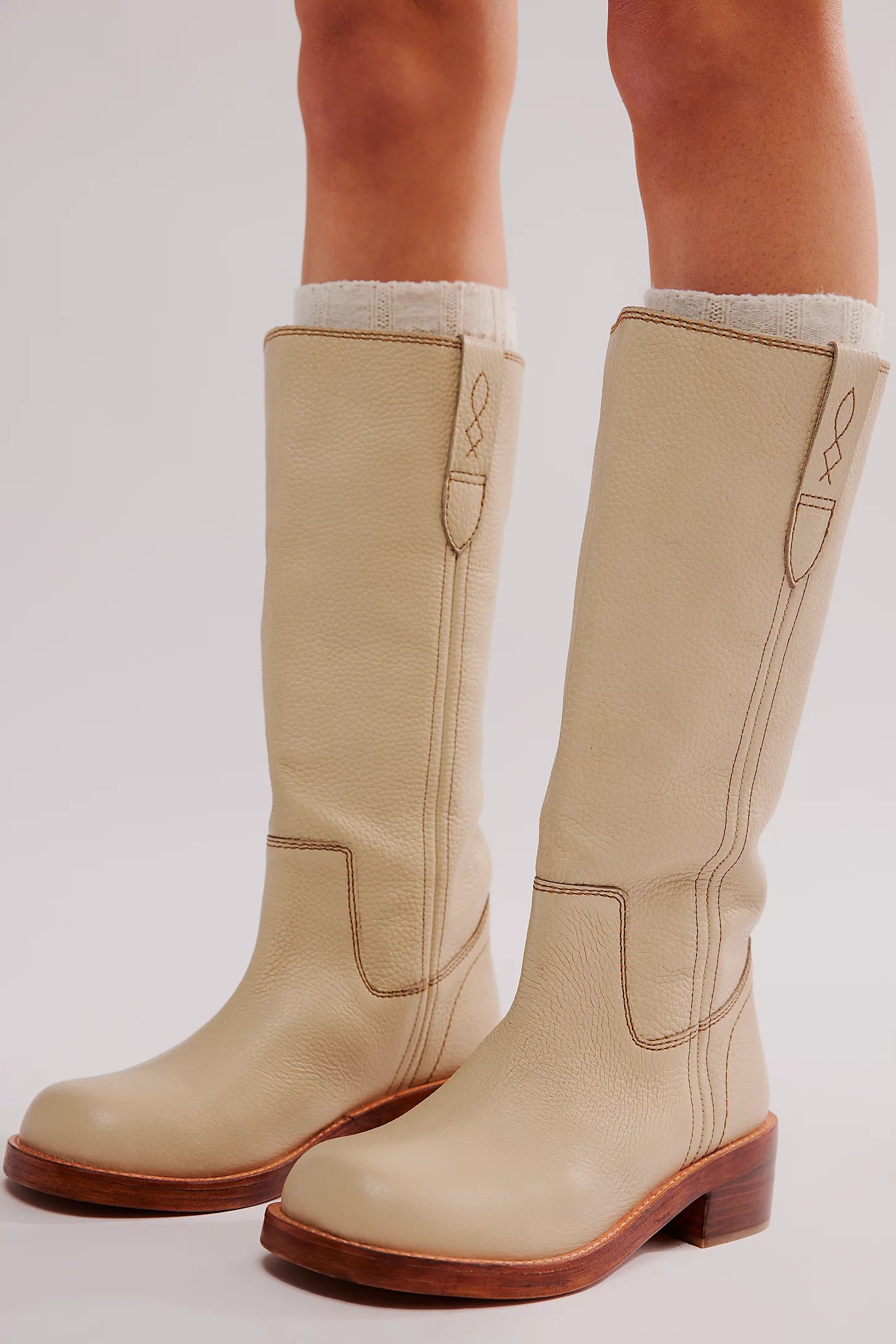 Free People Blaze Pull-On Boots featuring a tall silhouette, square toe, and stacked leather heel with distressed details, Parchment Leather