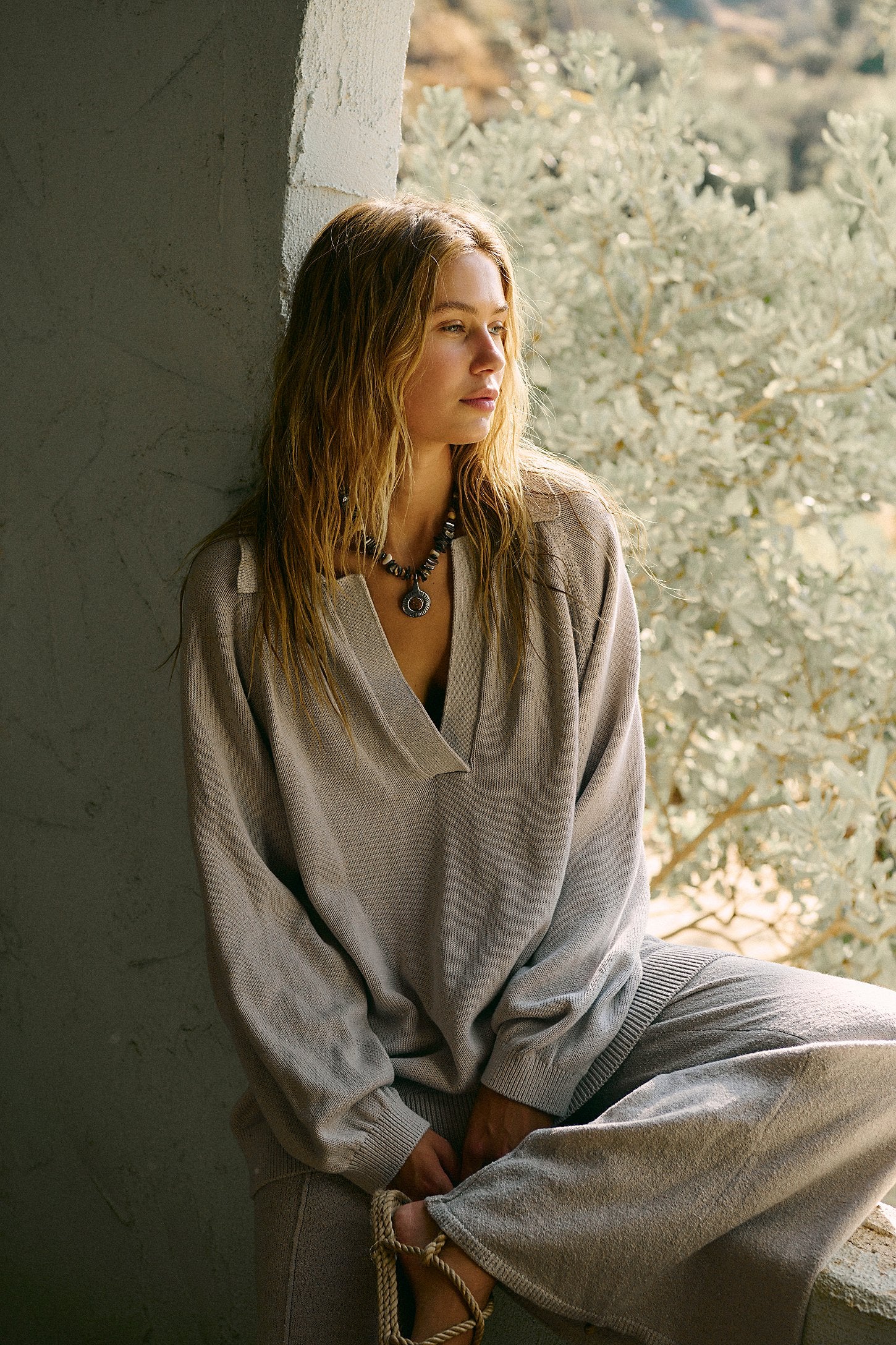 Free People Drea Sweater Set in a cozy knit fabric, featuring a relaxed-fit long-sleeve sweater and matching wide-leg pants, styled for a casual, comfortable look, Quiet Grey