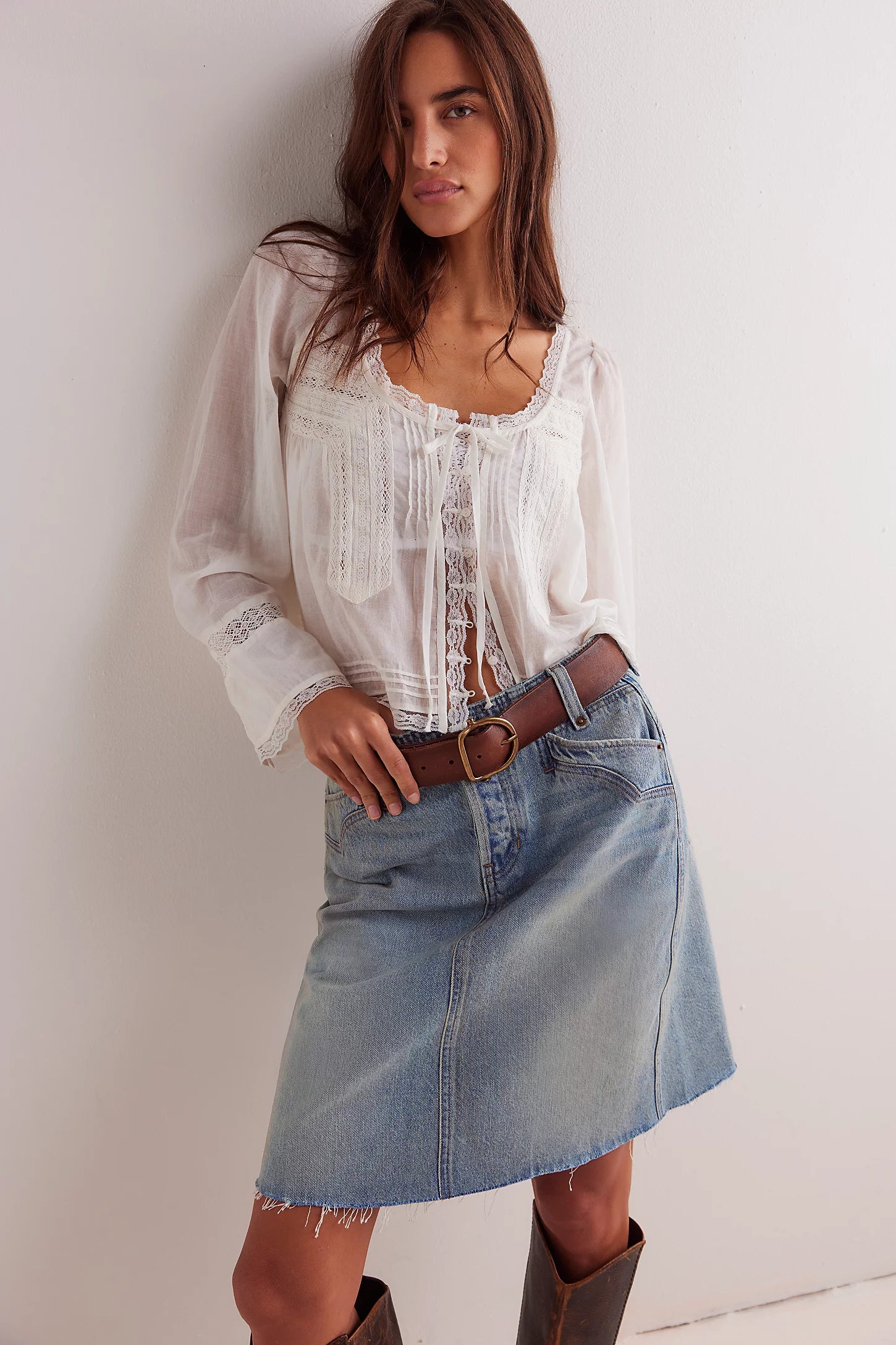 We The Free Denim Mini Skirt – a relaxed column-fit skirt with a zip fly, button closure, four-pocket styling, western-inspired yoke detailing, and frayed hemline, Sun Stoned Blue