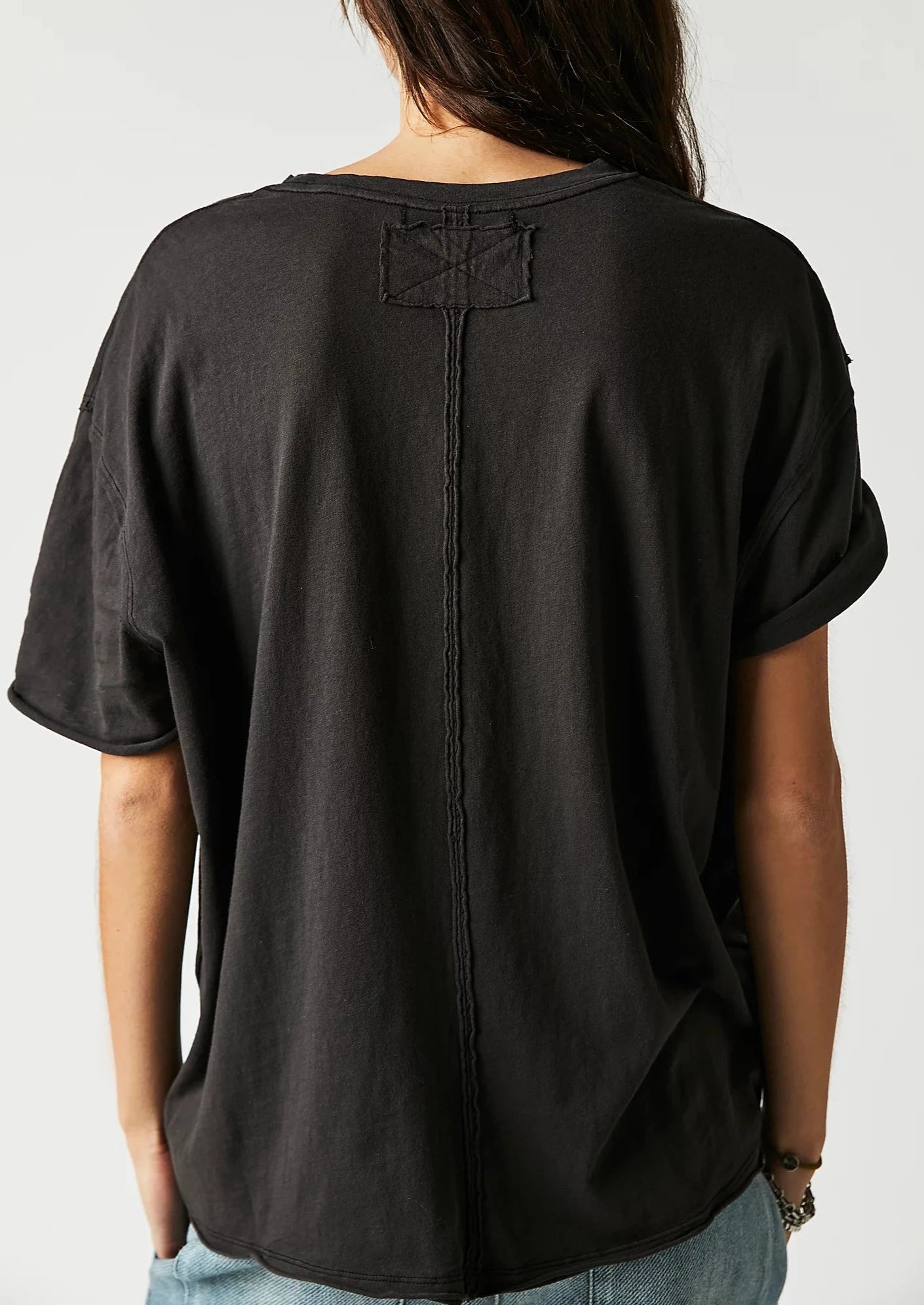 Free People The Nina Tee – A relaxed, classic-fit tee made from soft fabric, offering a comfortable and casual style, Black