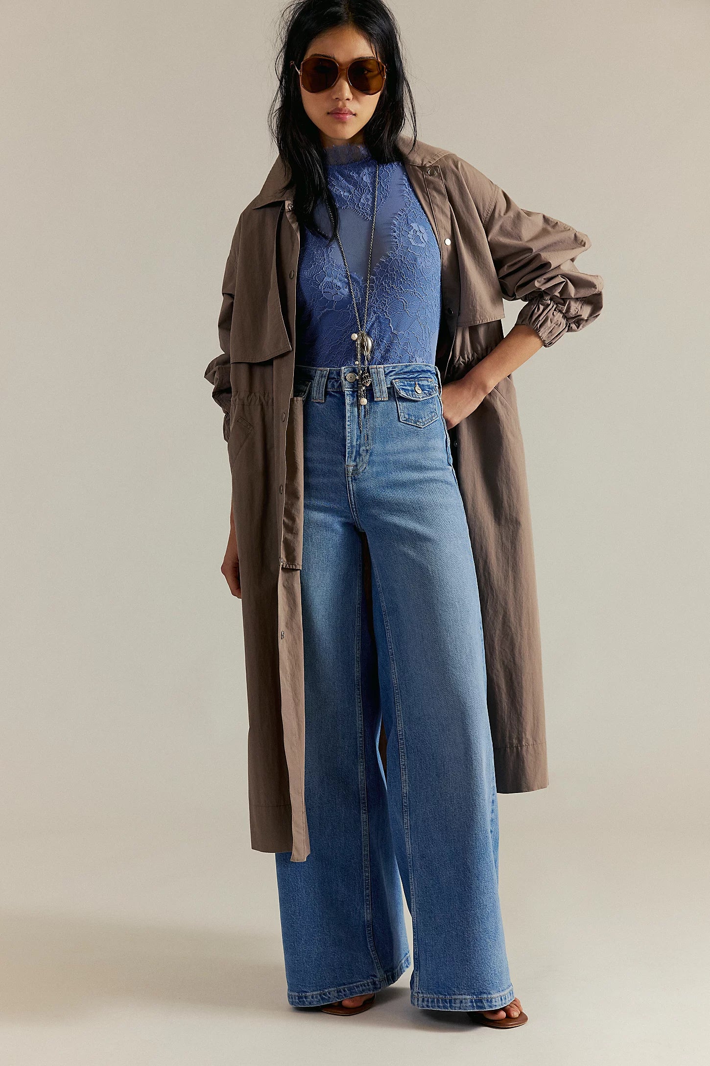 We The Free Kellee high-rise palazzo jeans in light-wash denim, featuring a fitted waist, wide-leg silhouette, Plaza Blue