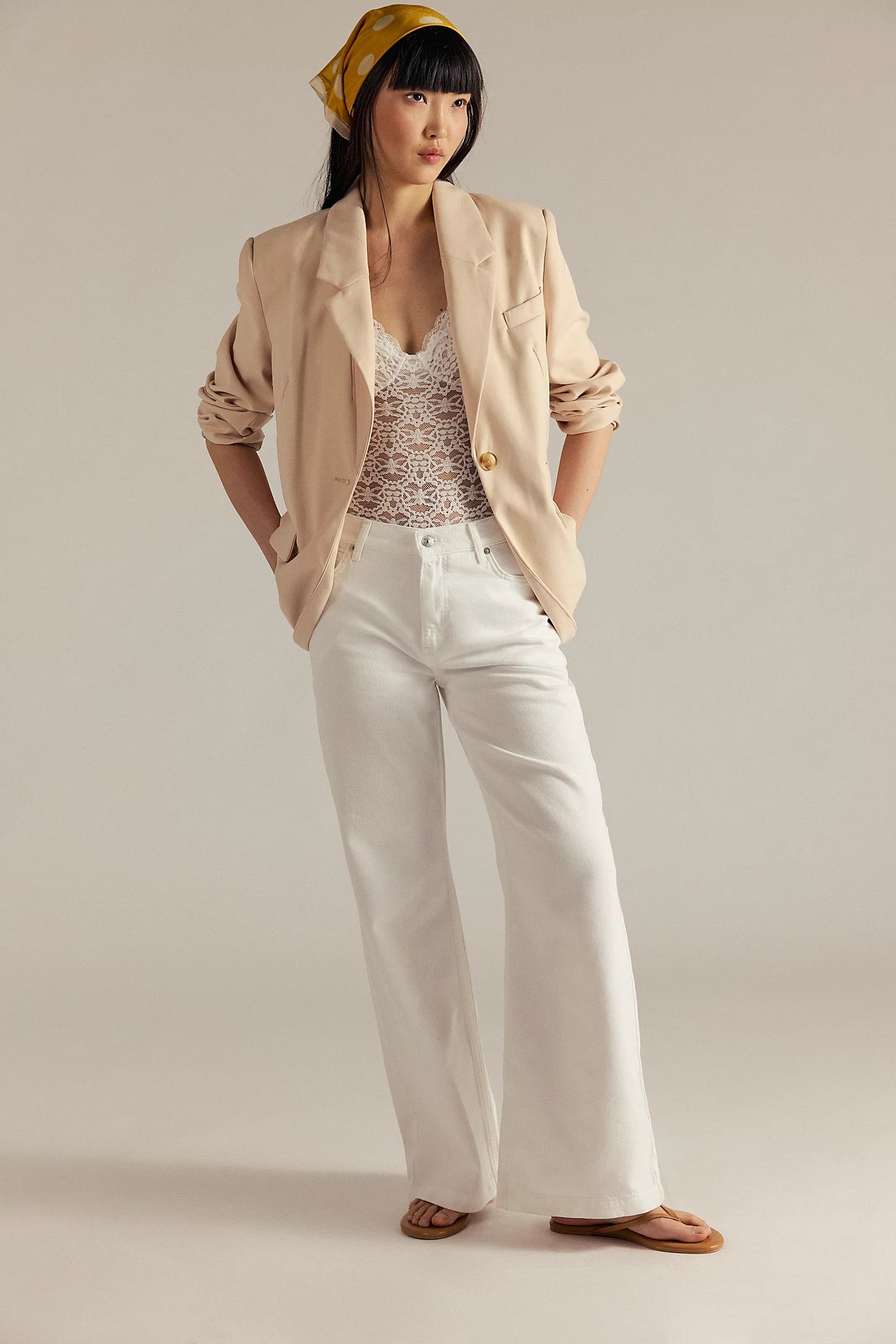 Free People Stride Straight N' Wide jeans, low-rise, wide-leg jeans in a soft, drapey denim. The jeans have a relaxed fit with a zip fly, button closure, and classic five-pocket styling. Styled with a tucked-in top and ankle boots, the look is casual yet effortlessly chic, Optic White