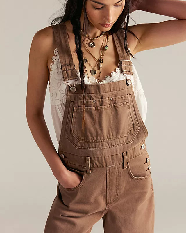 Free People Deep Trance Overalls in relaxed fit with wide-leg silhouette, boho-inspired design, and adjustable straps, Brown Sugar