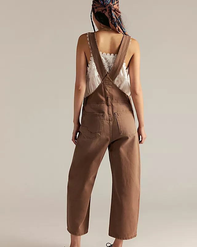 Free People Deep Trance Overalls in relaxed fit with wide-leg silhouette, boho-inspired design, and adjustable straps, Brown Sugar