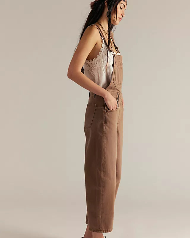 Free People Deep Trance Overalls in relaxed fit with wide-leg silhouette, boho-inspired design, and adjustable straps, Brown Sugar