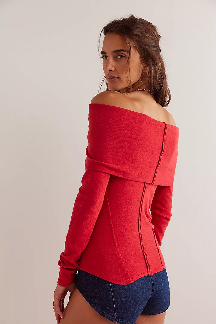 "Free People Iris Layering Top made from soft, stretchy fabric with an off-the-shoulder design. This fitted long-sleeve top offers a sleek, minimalistic look, perfect for layering under jackets or sweaters for a cozy yet stylish feel, Samba