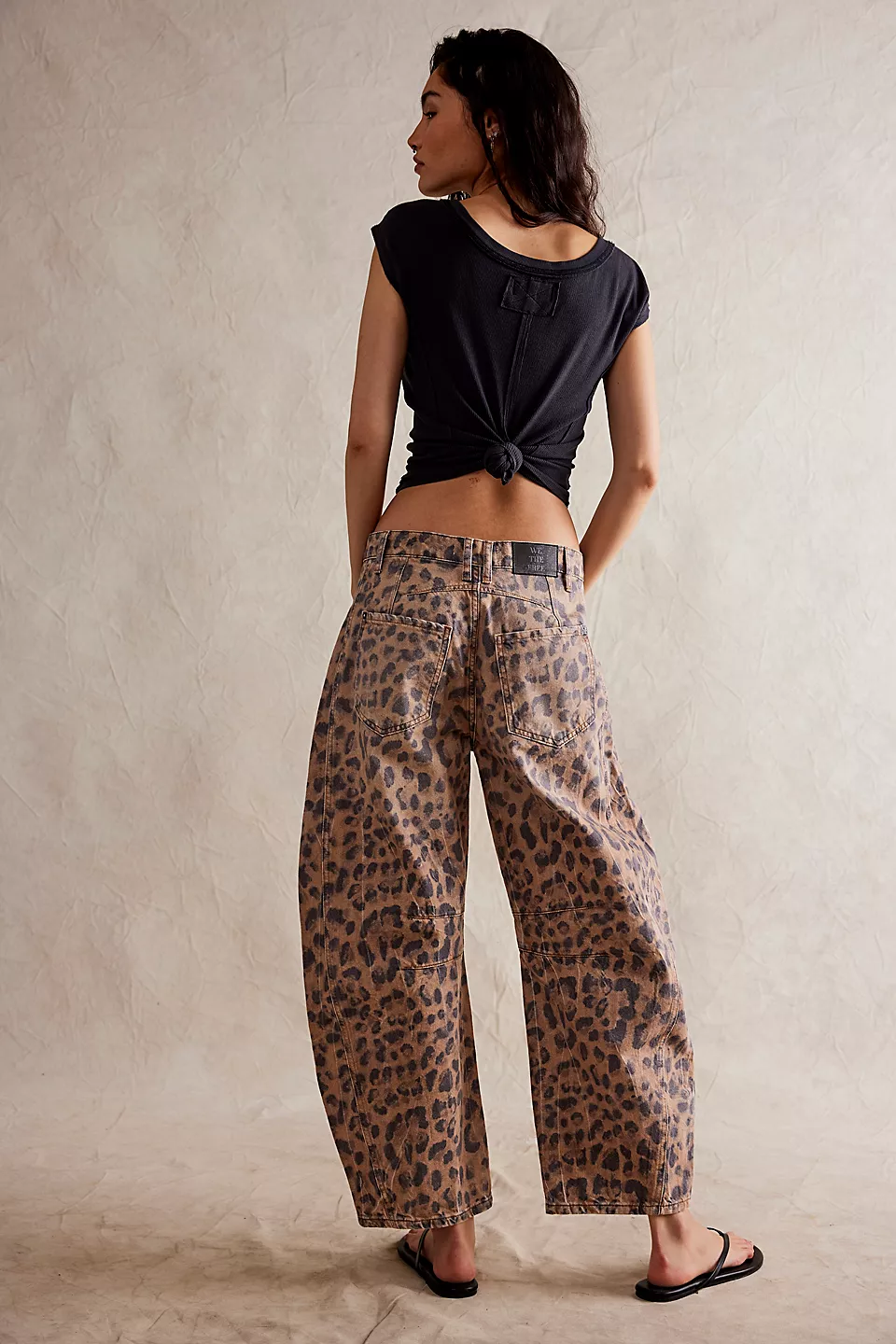 Free People Good Luck Printed Barrel featuring a relaxed, wide-leg design with a playful, all-over print. These pants offer a comfortable, mid-rise fit and a slight cropped length, perfect for adding a fun, boho-inspired touch to casual or laid-back outfits, Brown Sugar Combo