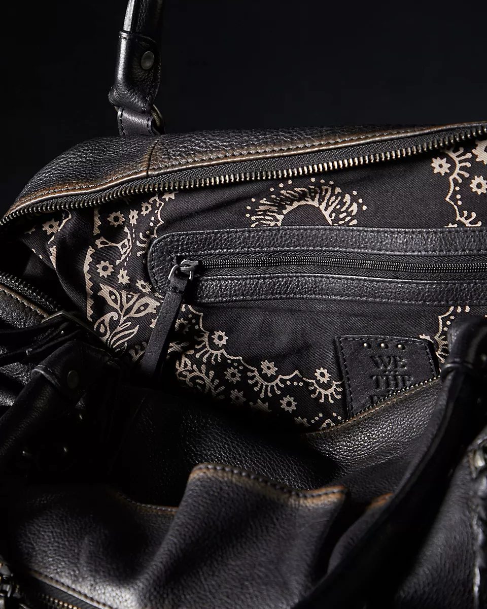 We the Free Emerson Tote Bag showcasing a spacious, simple design with sturdy handles, ideal for carrying essentials in style, Coal