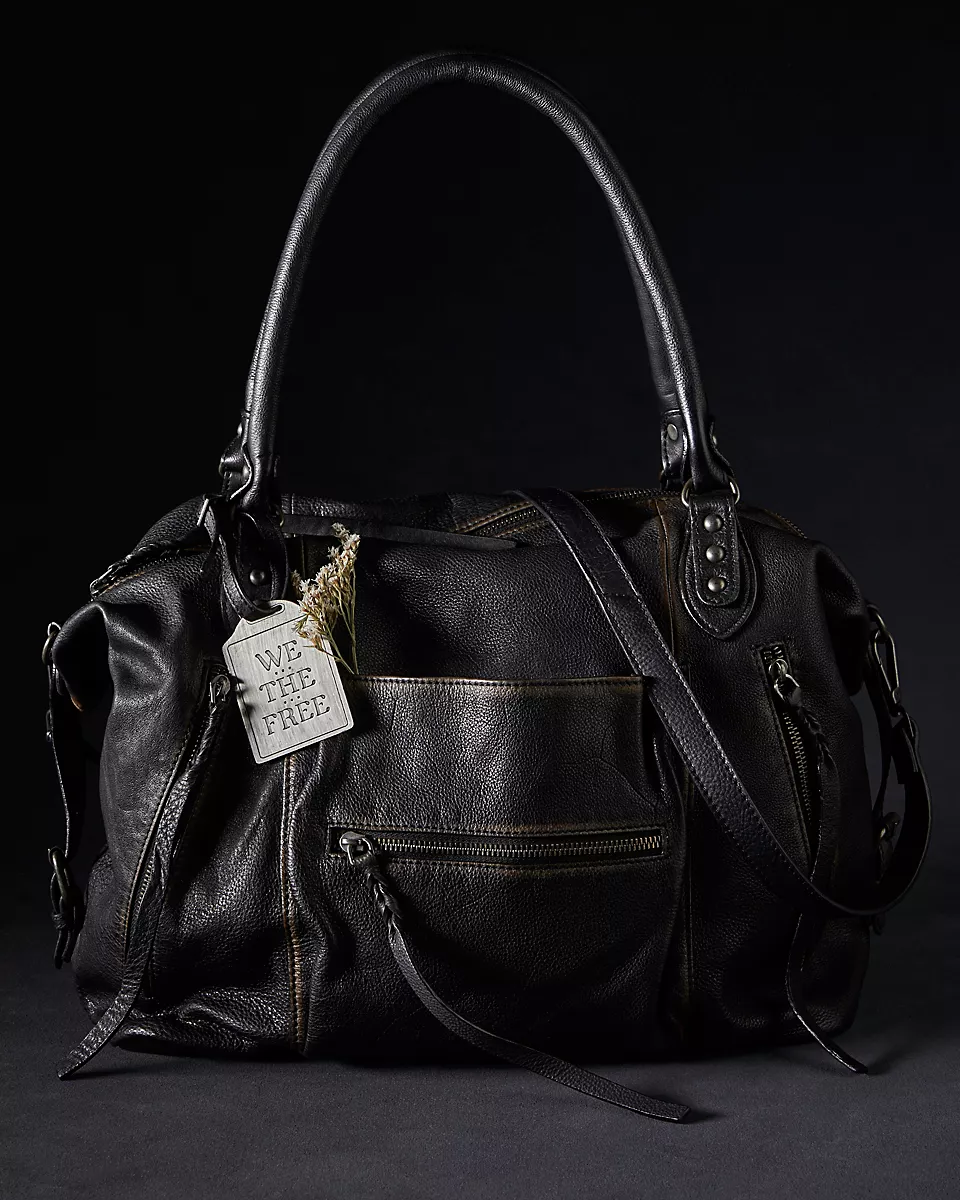 We the Free Emerson Tote Bag showcasing a spacious, simple design with sturdy handles, ideal for carrying essentials in style, Coal