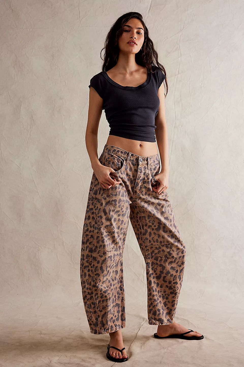 Free People Good Luck Printed Barrel featuring a relaxed, wide-leg design with a playful, all-over print. These pants offer a comfortable, mid-rise fit and a slight cropped length, perfect for adding a fun, boho-inspired touch to casual or laid-back outfits, Brown Sugar Combo