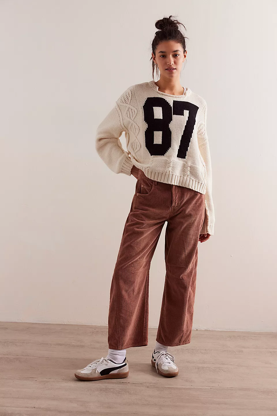 Free People Good Luck Cord Barrel Jeans made from soft corduroy fabric with a relaxed, loose fit and wide-leg silhouette. These jeans offer a comfortable, vintage-inspired look with a laid-back style, Emperador